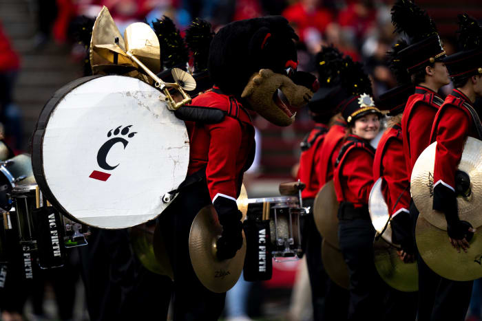 Cincinnati Bearcats mascot stands with the band before the NCAA Football game between the Cincinnati Bearcats and the South Florida Bulls at Nippert Stadium in Cincinnati on Saturday, Oct. 8, 2022. South Florida Bulls At Cincinnati Bearcats 0049